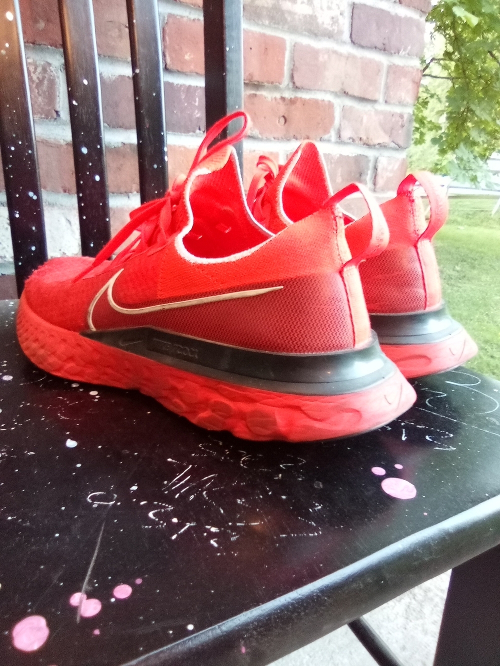 Nike Red Men's Athletic Running Shoes with Metallic Swoosh